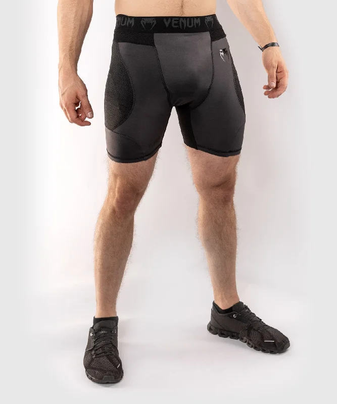 Men's pleated front twill shorts for a classic and sophisticated appearanceShort de compression Venum G-Fit Men's pleated front twill shorts for a classic and sophisticated appearanceShort de compression Venum G-Fit