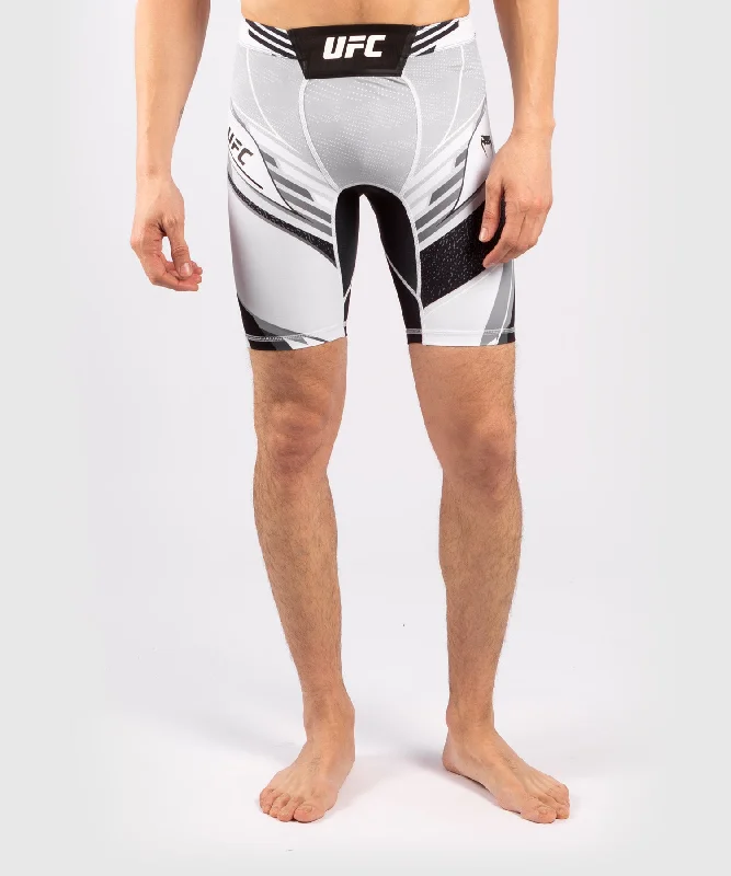 Men's moisture - wicking performance shorts for sweaty outdoor activitiesShort de Vale tudo Homme UFC Venum Authentic Fight Night - Coupe Longue - Blanc Men's moisture - wicking performance shorts for sweaty outdoor activitiesShort de Vale tudo Homme UFC Venum Authentic Fight Night - Coupe Longue - Blanc