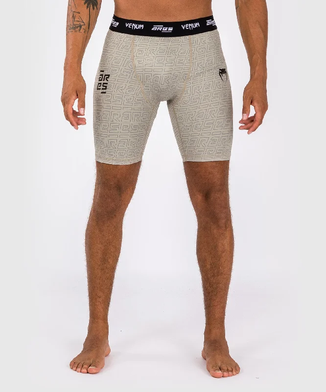 Men's side - stripe track shorts for a sporty running lookShort de Compression Vale Tudo Venum x Ares 2.0 - Sable Men's side - stripe track shorts for a sporty running lookShort de Compression Vale Tudo Venum x Ares 2.0 - Sable