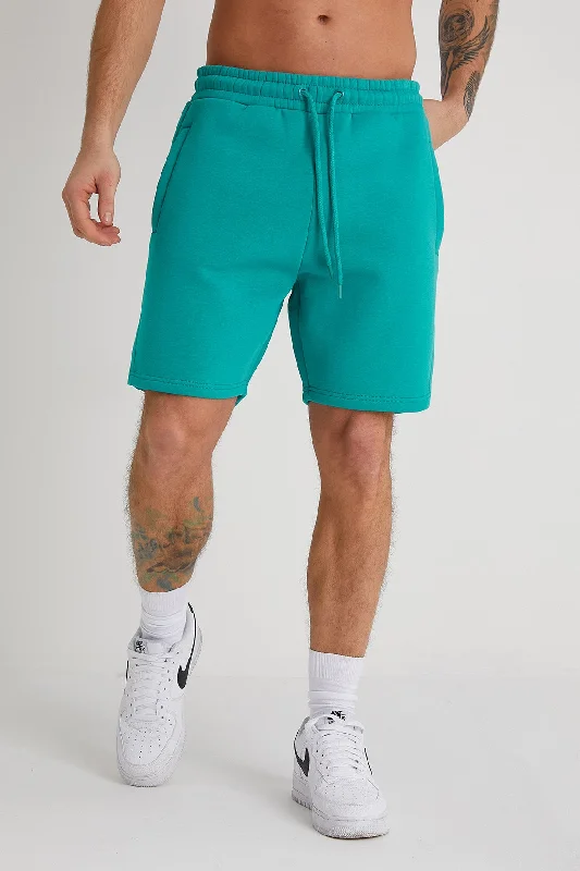Men's Distressed Jeans with Patches for a Retro and DIY - Inspired AppearanceBanks premium brushback fleece shorts in Jade