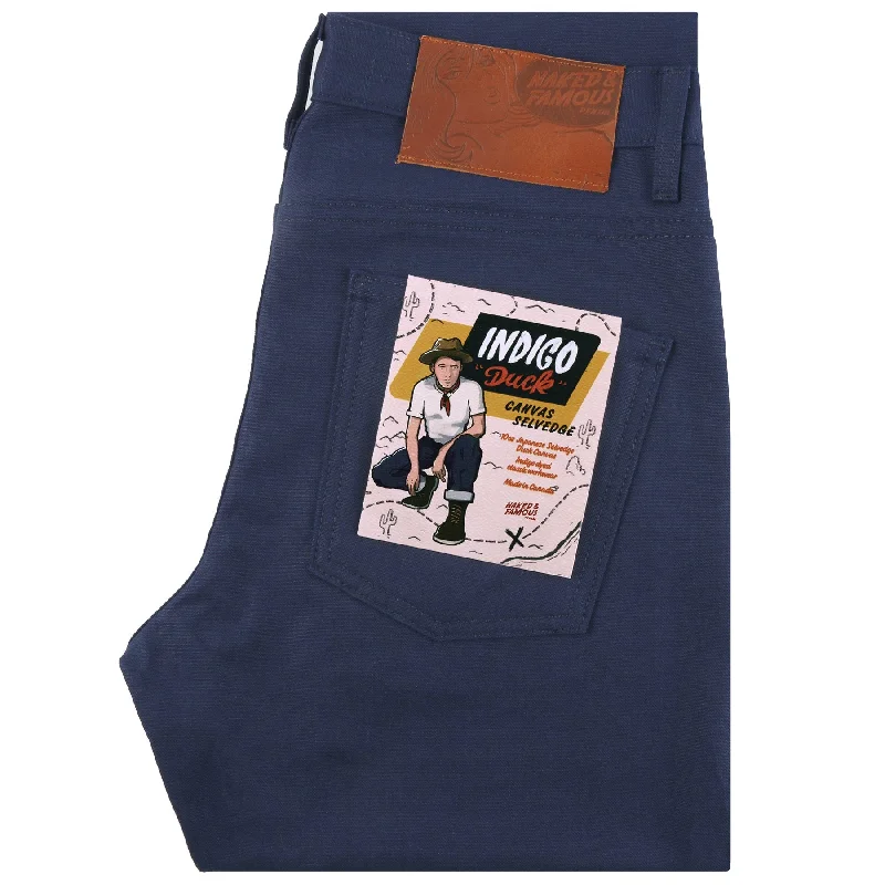 Men's Distressed Jeans with Patches for a Retro and DIY - Inspired AppearanceSuper Guy - Indigo Duck Canvas Selvedge Men's Distressed Jeans with Patches for a Retro and DIY - Inspired AppearanceSuper Guy - Indigo Duck Canvas Selvedge