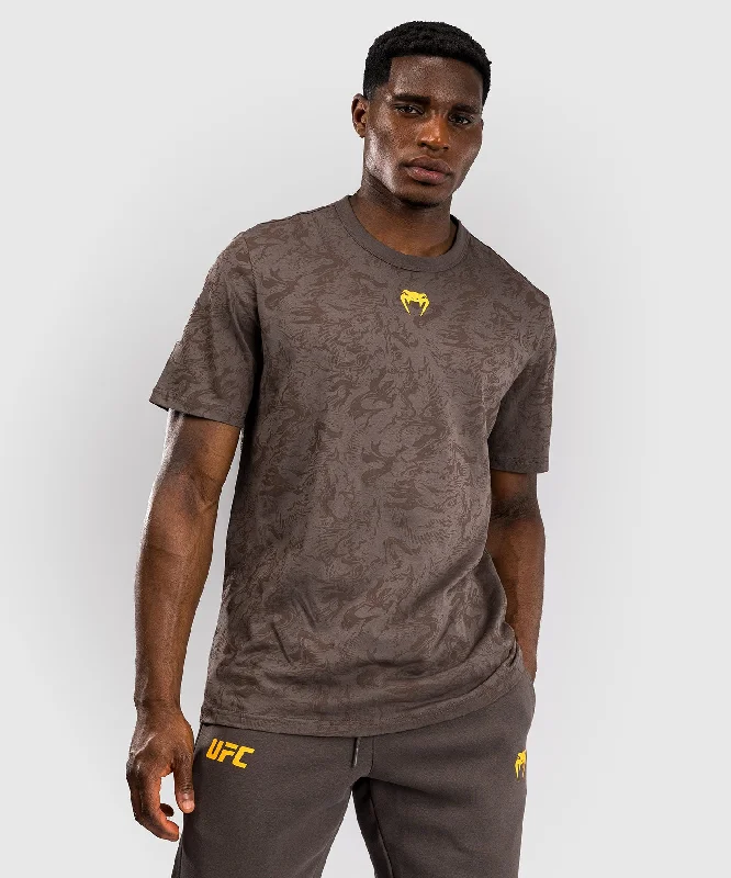 Men's long - sleeve henley t - shirts with button - down placketsUFC Fusion by Venum Fight Week Men’s Short Sleeve T-Shirt - Earthen Brown Men's long - sleeve henley t - shirts with button - down placketsUFC Fusion by Venum Fight Week Men’s Short Sleeve T-Shirt - Earthen Brown