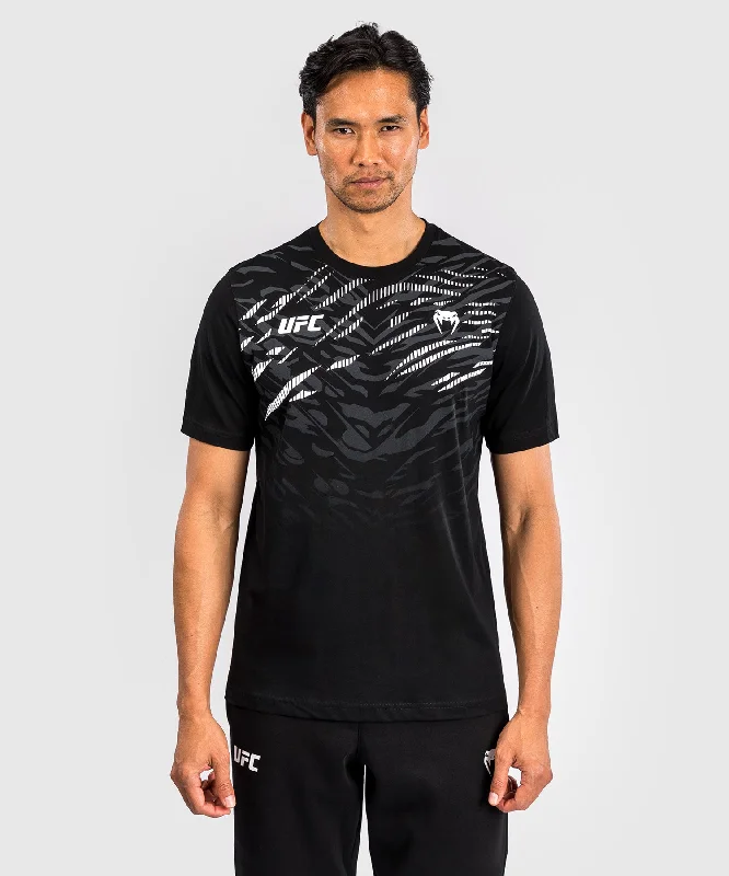 Men's mock - neck t - shirts with a modern and sleek styleUFC Fusion by Venum Men’s Replica Short Sleeve T-Shirt - Black Men's mock - neck t - shirts with a modern and sleek styleUFC Fusion by Venum Men’s Replica Short Sleeve T-Shirt - Black