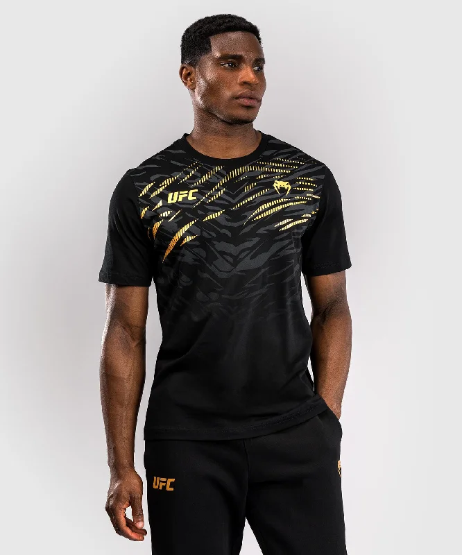 Men's short - sleeve linen t - shirts for summer beach outingsUFC Fusion by Venum Men’s Replica Short Sleeve T-Shirt - Champion Men's short - sleeve linen t - shirts for summer beach outingsUFC Fusion by Venum Men’s Replica Short Sleeve T-Shirt - Champion