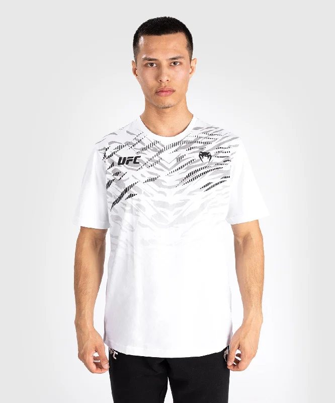 Men's antimicrobial t - shirts for odor - free freshness during travelUFC Fusion by Venum Men’s Replica Short Sleeve T-Shirt - White Men's antimicrobial t - shirts for odor - free freshness during travelUFC Fusion by Venum Men’s Replica Short Sleeve T-Shirt - White