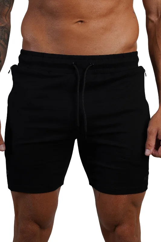 Men's zip - pocket canvas shorts for added functionality during travel ESSENTIAL SHORTS 2.0 - BLACK (Black Logo) Men's zip - pocket canvas shorts for added functionality during travel ESSENTIAL SHORTS 2.0 - BLACK (Black Logo)