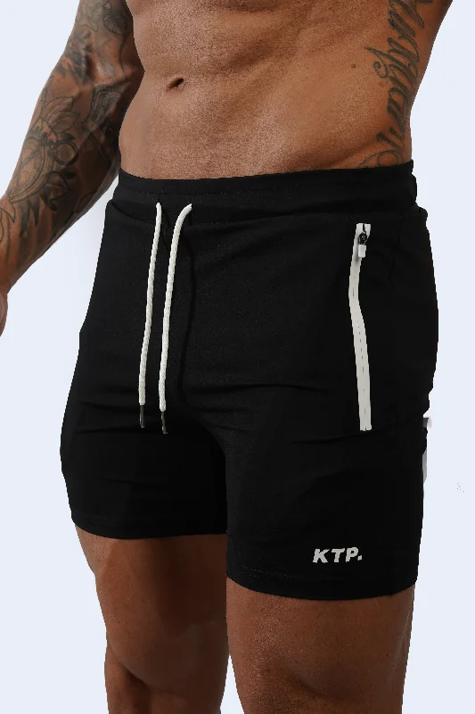 Men's flat - front chino shorts for semi - formal summer events HYBRID SHORTS - BLACK Men's flat - front chino shorts for semi - formal summer events HYBRID SHORTS - BLACK